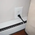 Electrical Outlet Above Hot Water Baseboard Heater